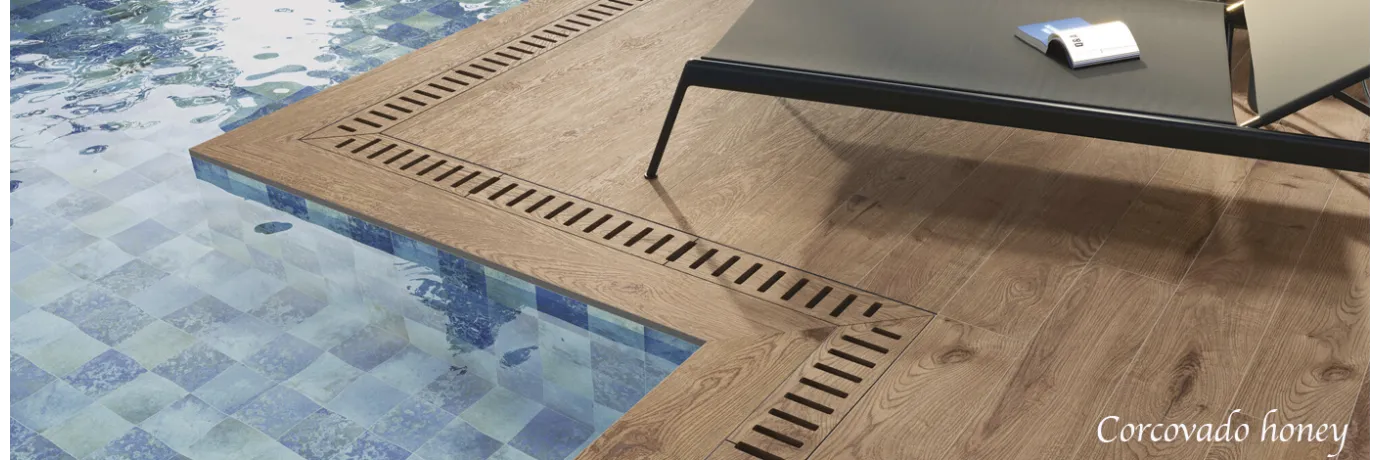 carrelage extérieur corcovado honey dans les ton marron pour le contour de la piscine