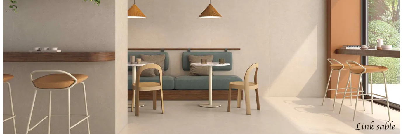 Carrelage sol effet pierre Link Sable beige pour un bar style moderne