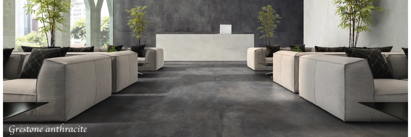 Carrelage fin intérieur Grestone antracite pour le sol d'un restaurant style moderne