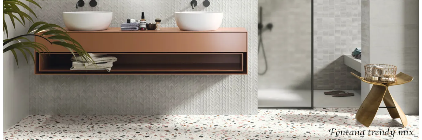 Carrelage sol Fontana Trendy mix dans les tons blans marron gris noir pour le sol de la salle de bain