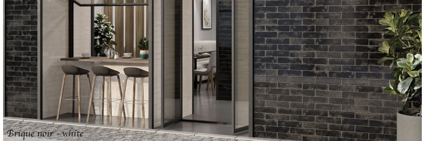 Carrelage effet zellige Brique noir et blanc pour la façade d'un café style déco voyage