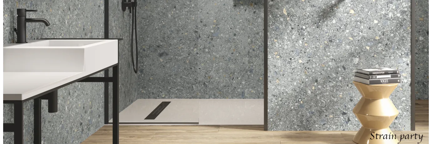 Carrelage effet Terrazzo Strain party gris foncé pour l'intérieur de la douche