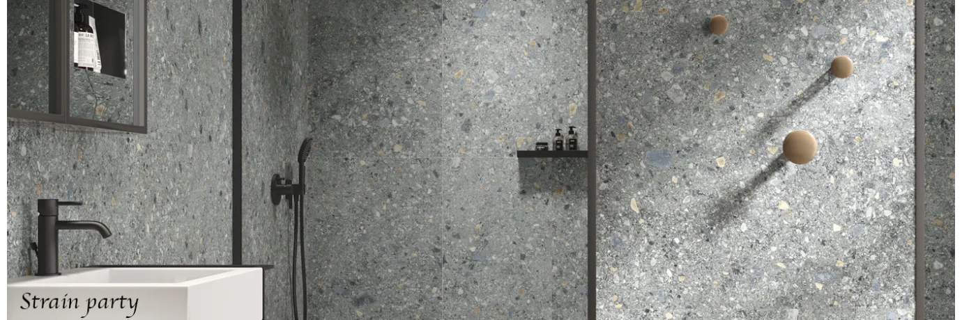 Carrelage effet terrazzo Strain party gris anthracite pour la salle de bain