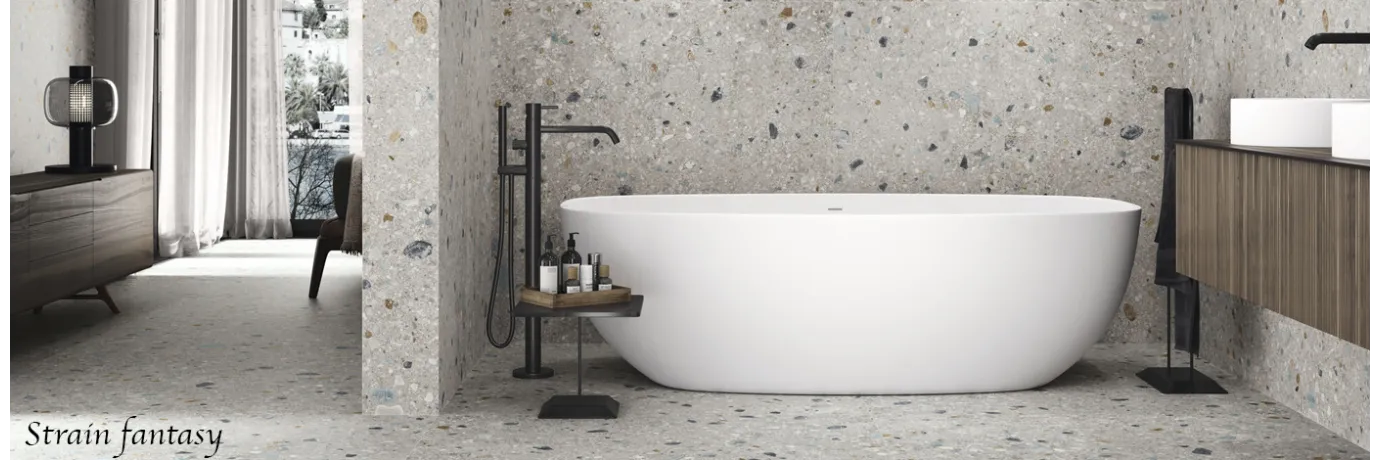 Carrelage effet terrazzo Strain fantasy gris clair pour la salle de bain style déco design
