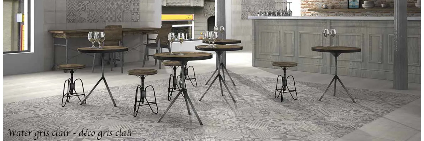 Carrelage effet carreaux de ciment Water déco gris clair pour un bar