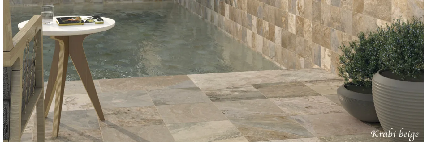 Dalle extérieur effet pierre Krabi 2.0 beige pour le contour de la piscine style pierre de bali
