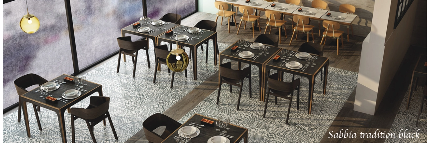 Carrelage sol effet carreaux de ciment tradition noir pour le sol d'un restaurant